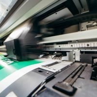 Graphic design and  advertising concept. Large format plotter, close up